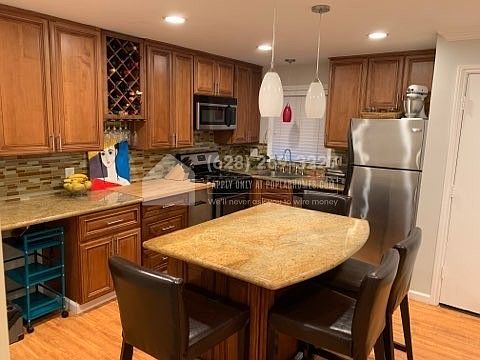 5th image of 3529 E Broadway #5