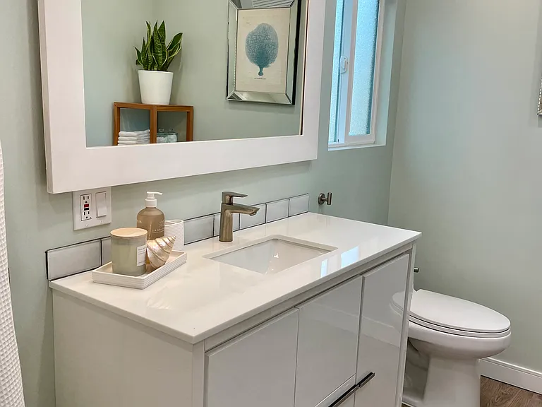 4' vanity with ample storage.