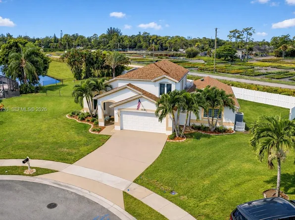 112 Camelot Ct, Royal Palm Beach, FL 33411