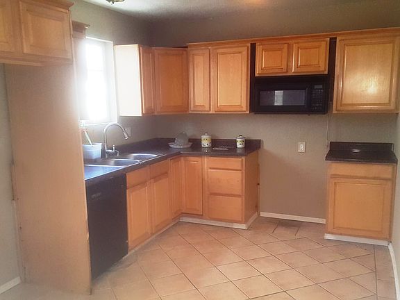 5th image of 8736 1/2 Holmes Ave