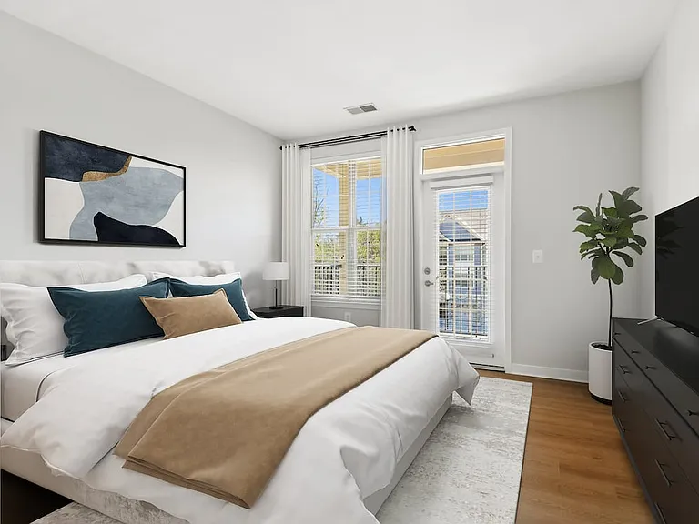 Renovated Package II bedroom with hard surface flooring