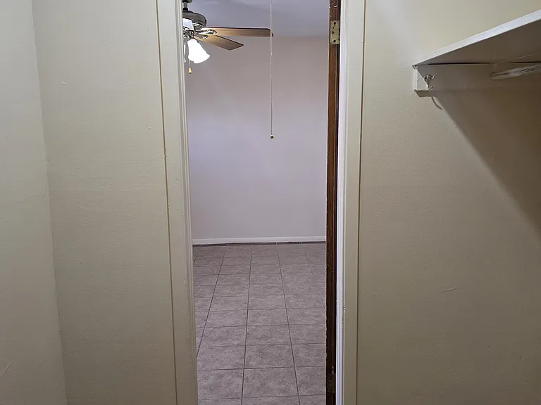 Closet looking into bedroom