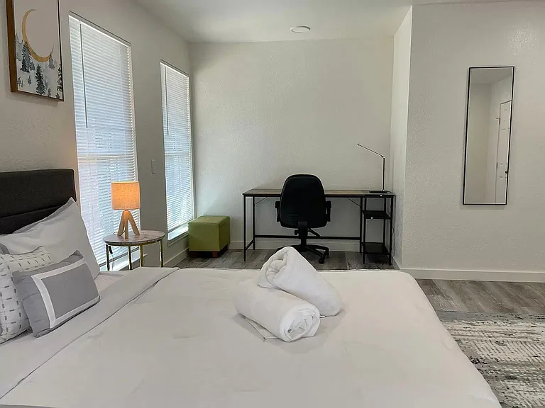 A very large bedroom #2, with a working space.