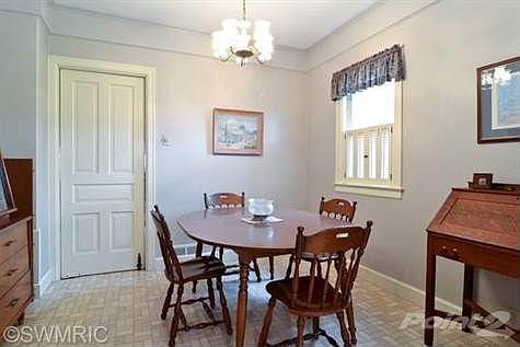 Dining room adjacent to kitchen.