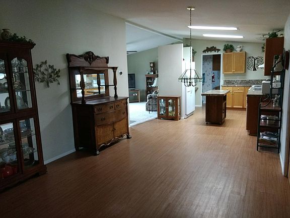 View from dining room into kitchen and front room