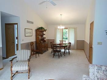 The living area is open to the formal dining room allowing for the largest of family dinners to be shared and enjoyed.