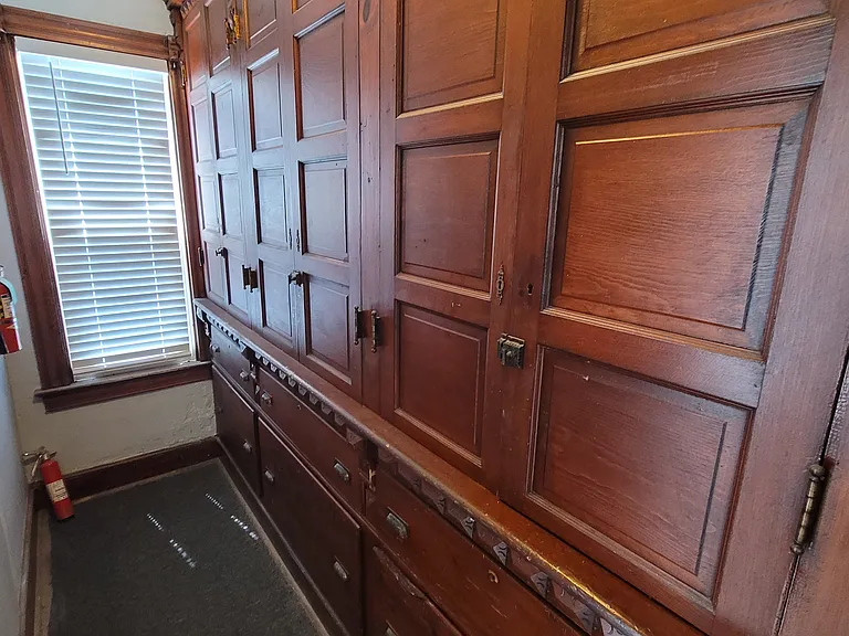 Storage Closet with Built In Cabinets