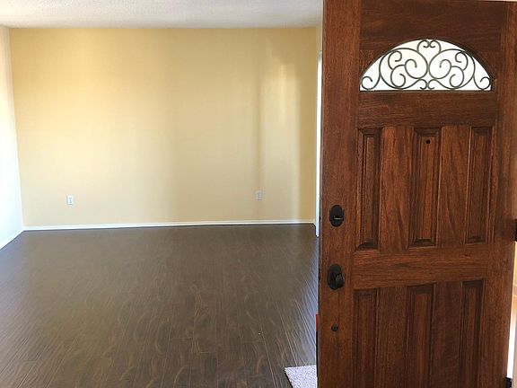 Kitchen looking into living room