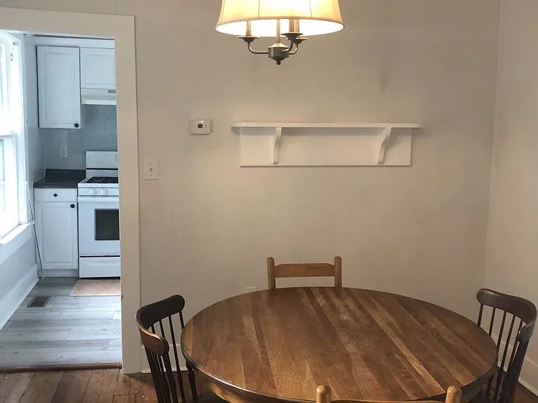 Dining Room Table and Chairs looking toward kitchen