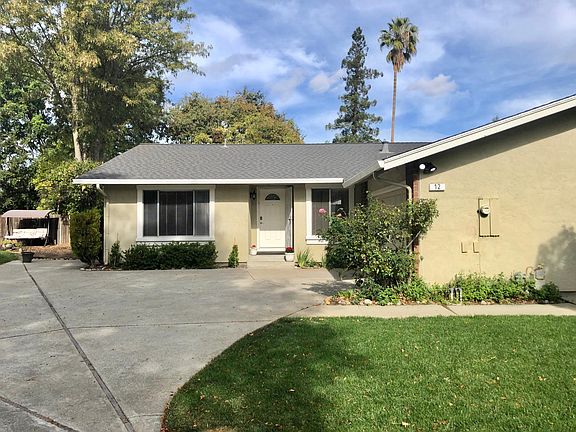 Front and back lush lawns maintained by gardener. Private parking to left, in front or in the two car garage.