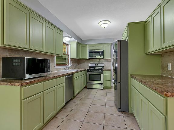5th image of 6918 Toledo Ave N
