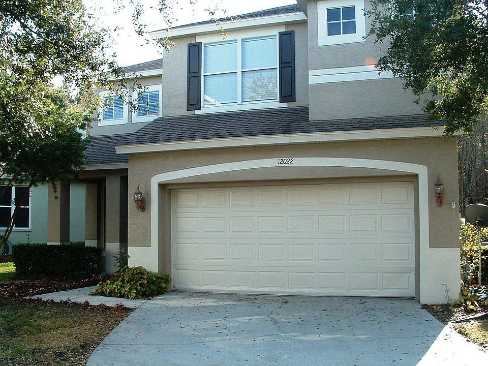 front 2 car garage + parking pad