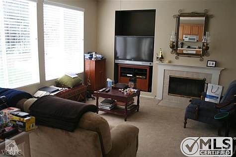 Family room with fireplace.