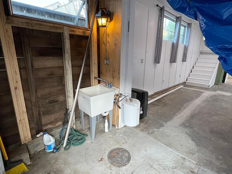 Front storage area with mop sink