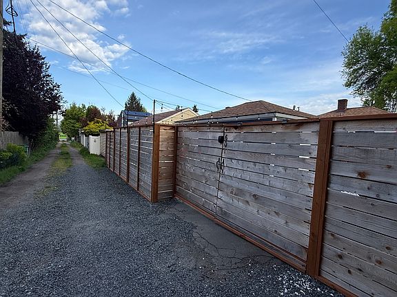 Secure access off alley or enter by crossing through main house yard