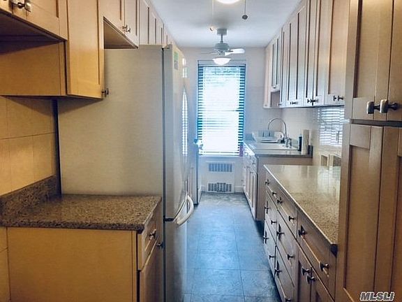 2nd image of 8385 Woodhaven Blvd APT 1J