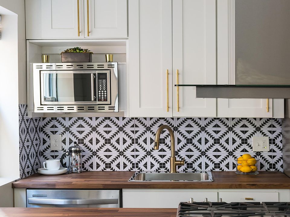 Brand new soft-shut cabinets and stainless appliances