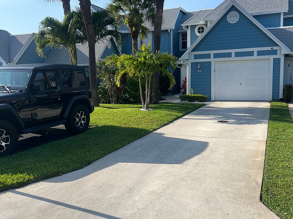 Extra long driveway to accommodate multiple cars and ample guest parking. New LiftMaster garage system can be controlled by phone.