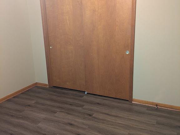 bedroom with new vinyl plank flooring
