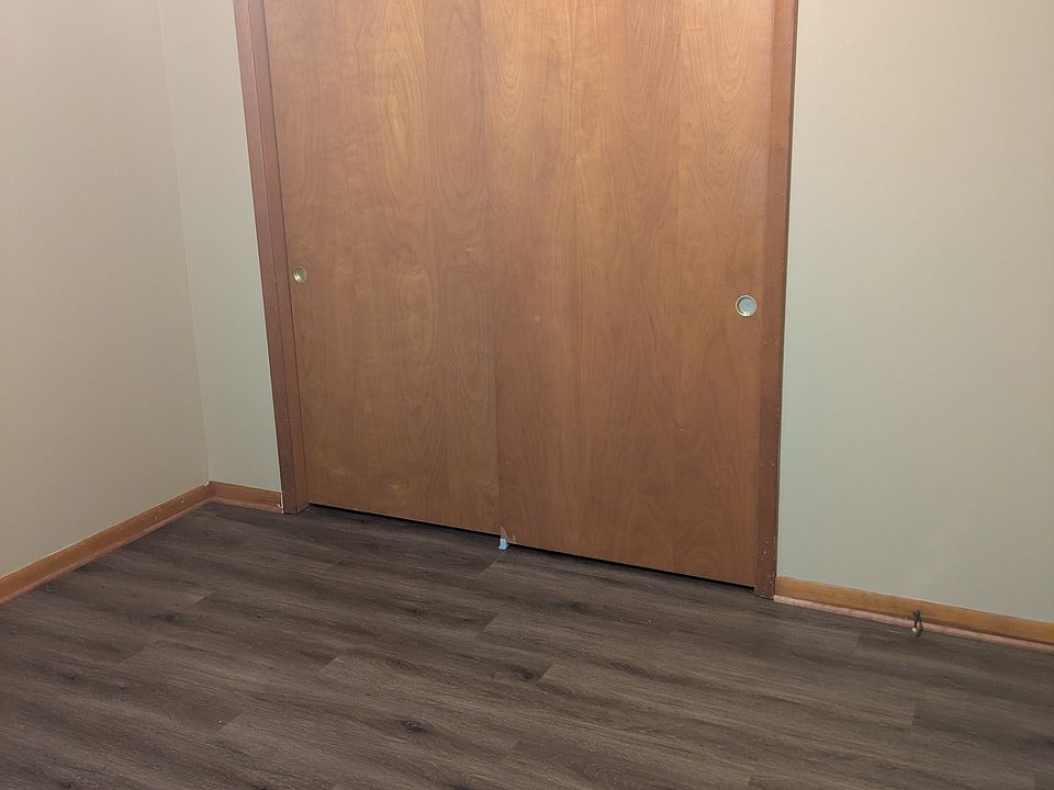bedroom with new vinyl plank flooring