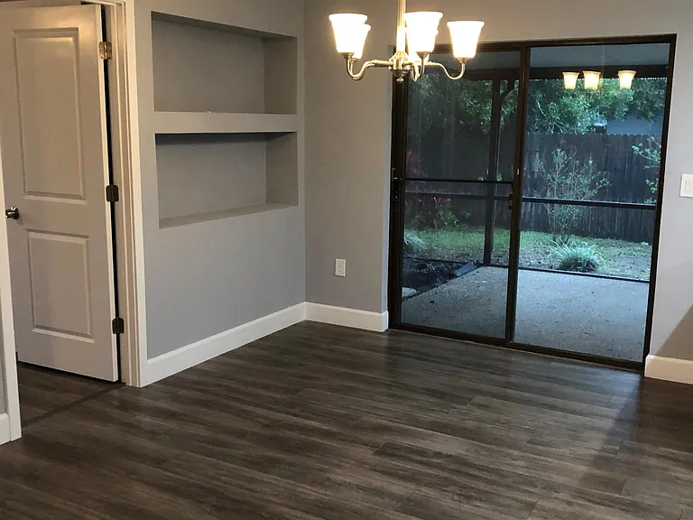 Dining area leads to the screened lanai patio.