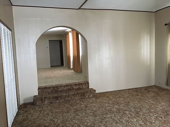 Den looking into Living Room