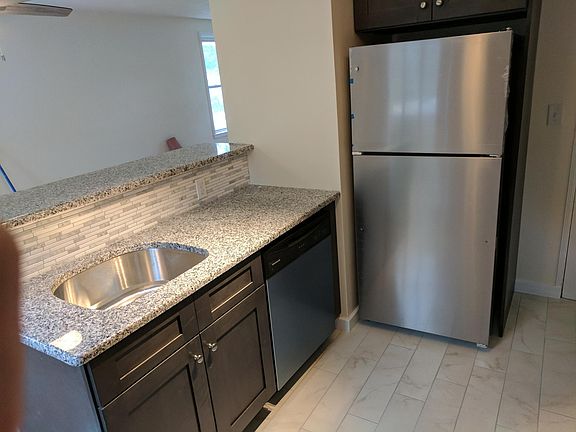 Nice tiled floor & backsplash