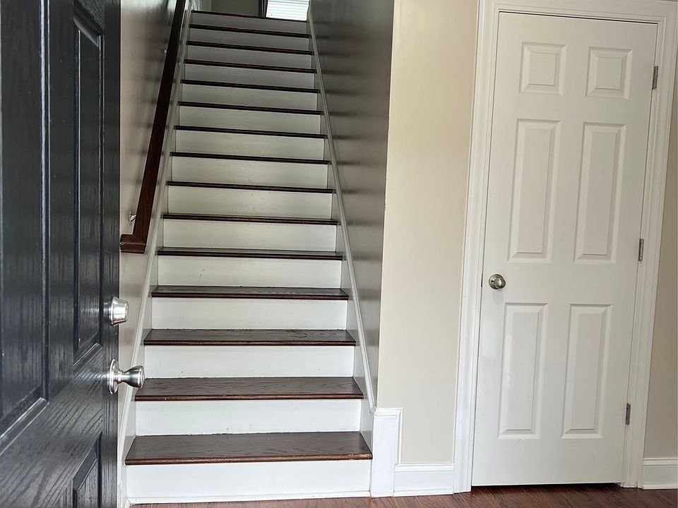 entrance , the door to the garage is on the right side