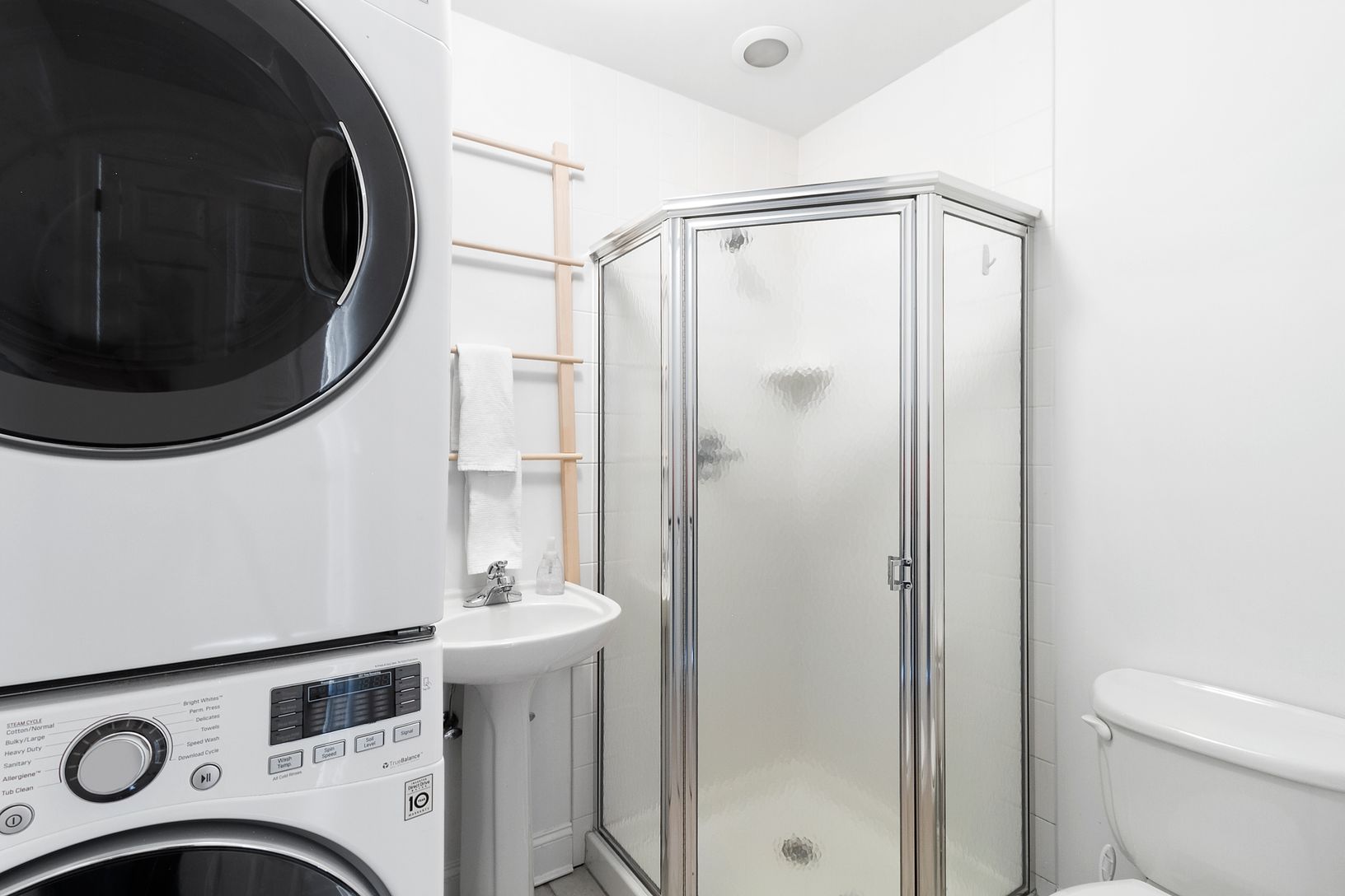  Laundry room with full bathroom off kitchen