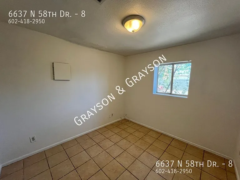 6637 N 58th Dr — Photo 13