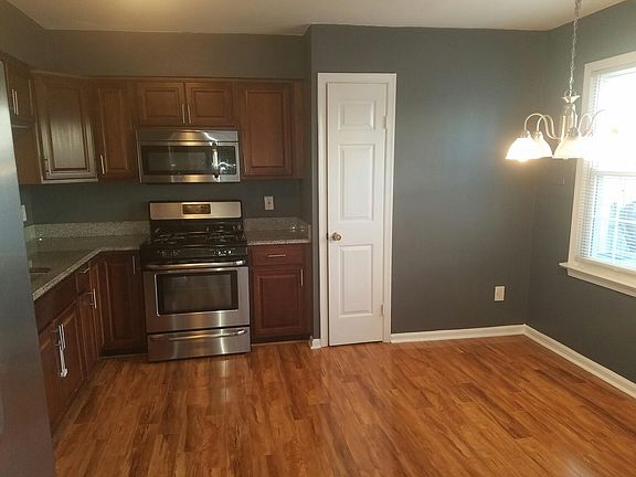 Kitchen has room for a small table in the nook. 