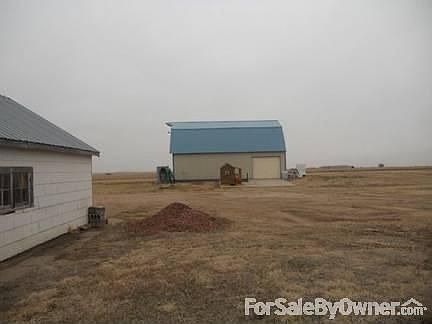 Heated shop and 2 car unattched garage : I have steel sheeting for garage to match the shop.