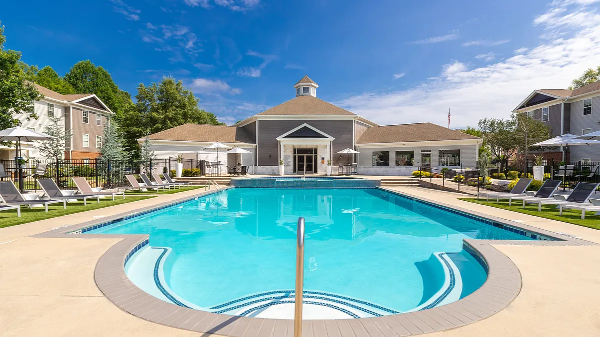 Enjoy our sparkling swimming pool and covered gazebo area perfect for relaxation and socializing, professionally operated by Highlands Vista Group. - The Foundry