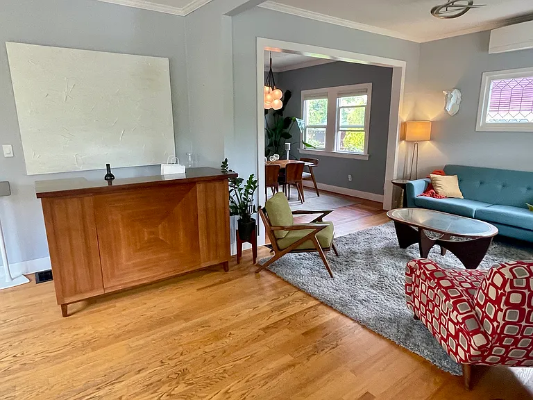 Foyer flows into the living room.