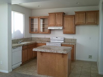 Kitchen Has Granite Counters, Electric Range, Dishwasher & Garbage Disposal