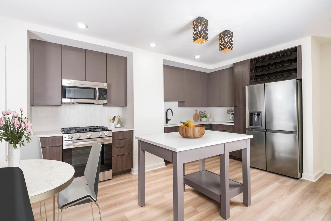 Discover your dream home at Modera Parkside! Our premium collection homes feature elegant under-cabinet kitchen lighting, distinctive fixtures, upgraded countertops, a stylish tile backsplash, and a captivating two-tone cabinet finish that elevates your l