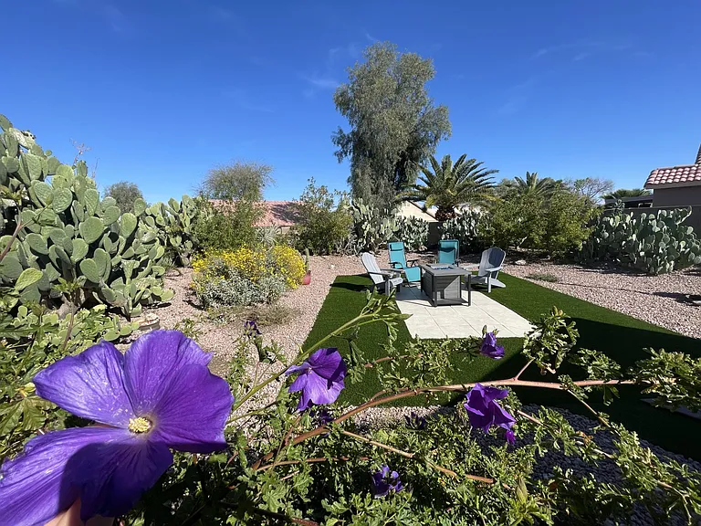 Luscious large golf course community backyard with new Outdoor feature soft to step on for sunseekers to enjoy!