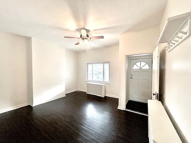 Large living room. Light & bright with engineered hardwood flooring.