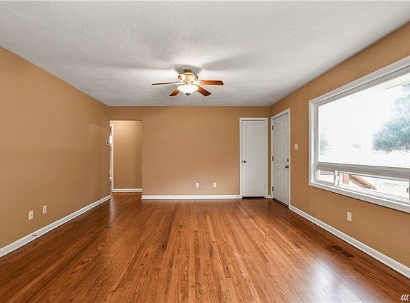 Beautiful refinished hard wood floors.