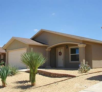 1 exterior with low maintenance desert landscaping