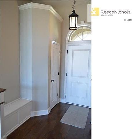 Entry hall closet and a built in storage bench