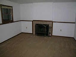 Lovely family room with fireplace and neutral decor