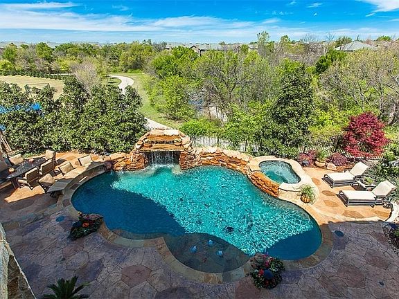 Private backyard backs to creek and walking trail.