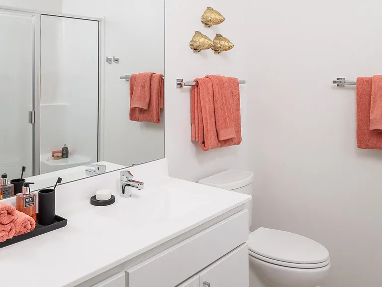 Bathrooms feature upgraded fixtures and finishes