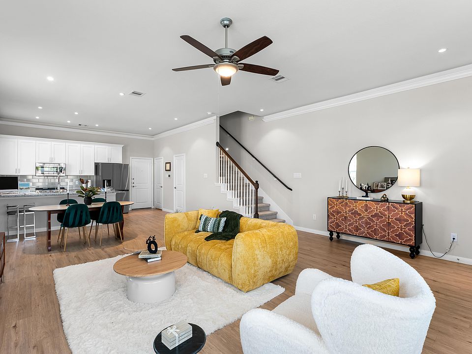 Phase II | Open Concept Living/Dining Room with Crown Molding (Plan 4201)