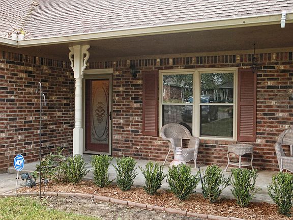 Inviting covered porch welcomes you into the home