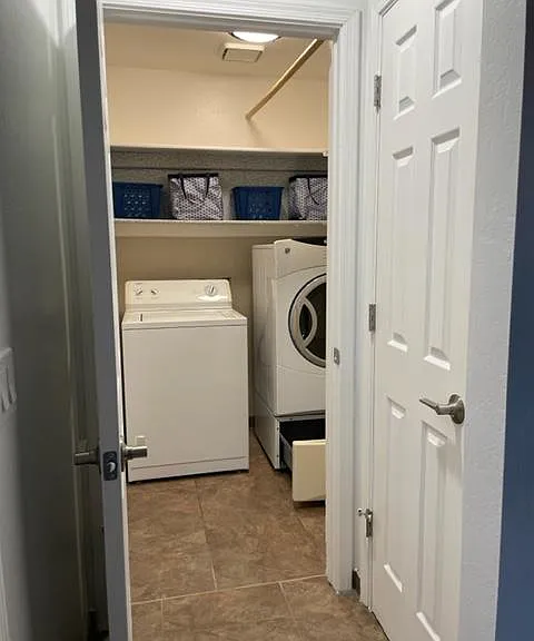 Walk in laundry room. Washer and dryer included