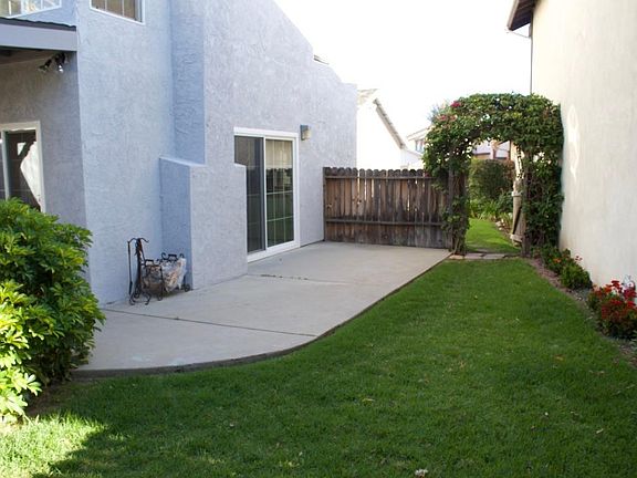 Side deck and gate to front yard