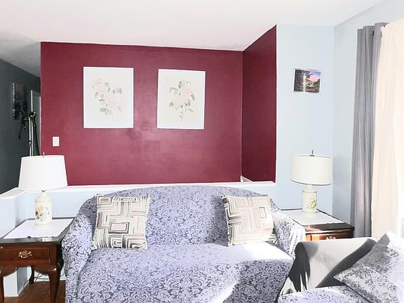 2nd fl livingroom entry stairs along the red wall