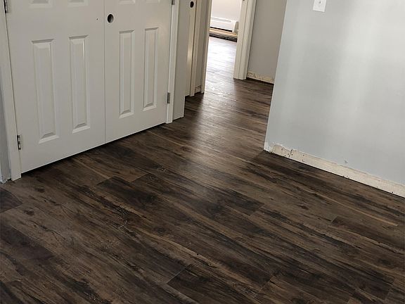 LR floor, laundry closet with peak into BR - work in progress